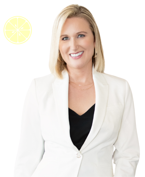 Katherine Sauer, a smiling blonde woman, wearing a white blazer